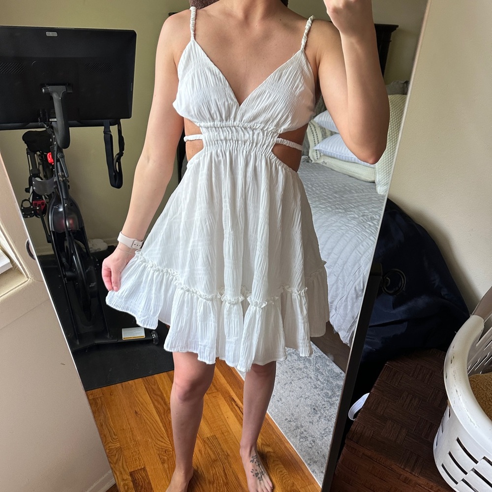 High flier open back white mini dress